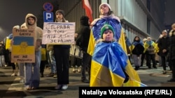 Ukrainian refugees in Warsaw take part in an event expressing gratitude to Poland for taking them in on the third anniversary of Russia's full-scale invasion of Ukraine on February 22, 2022. 