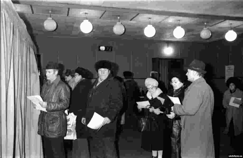 Voters wait patiently to cast their ballots at the Kalinin mine in Donetsk, eastern Ukraine.