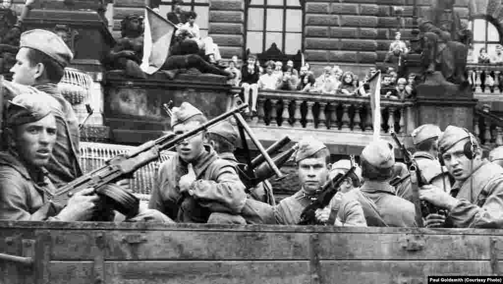 Trucks full of heavily armed soldiers rumbled past the National Museum. Despite the danger, in the faces of these young soldiers I saw confusion and bewilderment.