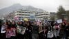 Women chat slogans during a protest against the killing of seven people from the Hazara community in Kabul on November 11.