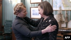 Like U.S. Assistant Secretary of State Victoria Nuland (right), former Ukrainian Prime Minister Yulia Tymoshenko (left) has been caught on tape using some rather forceful, undiplomatic language. (file photo)