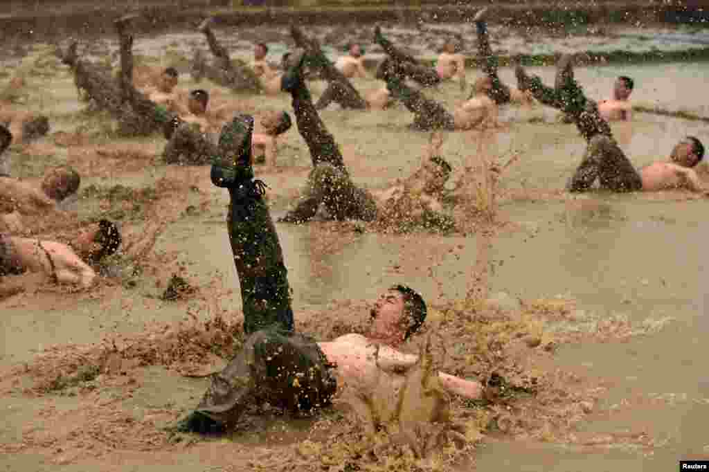 Chinese paramilitary policemen attend a training session in Guigang, Guangxi Zhuang Autonomous Region. (Reuters)