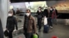 Armenian citizens wearing face masks to protect against the coronavirus returning from Iran last week. 