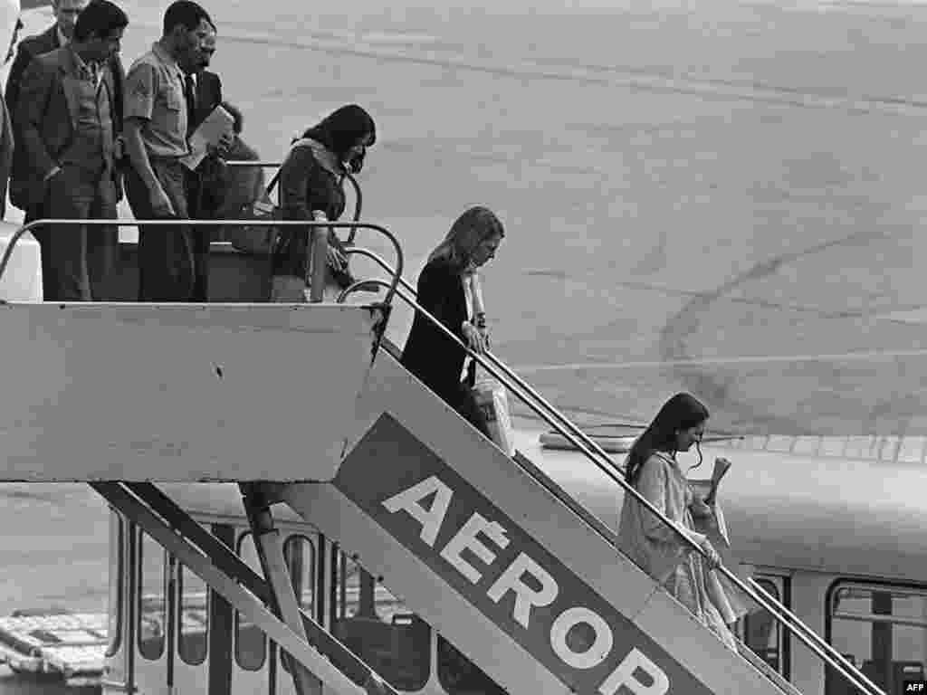 France -- Ex-hostages, released from the American embassy in Tehran, arrive at the Orly airport, 20Nov1979 - Ex-hostages, released from the American embassy in Tehran, arrive at the Orly airport in France, 20 November 1979. From left to right Westley Williams (3rd L), Elisabeth Montagne, Jean Walsh and Terry Redford. 04 November 1979, 400 islamic students took around fifty of american diplomats hostage who stayed at the embassy of Tehran, Iran