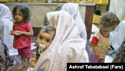 Mothers and their children in a women penitentiary near Tehran, undated.