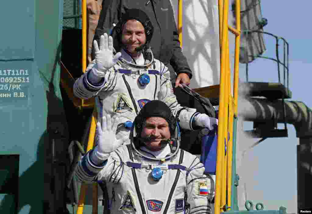 Nick Hague of the United States and Aleksei Ovchinin of Russia board the Soyuz MS-10 spacecraft on October 11.