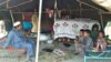 A Mosuli family rests in their traditional tent near Khost city.