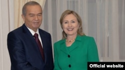 U.S. Secretary of State Hillary Clinton with Uzbek president Islam Karimov in Tashkent