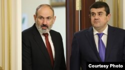 Armenian Prime Minister Nikol Pashinian (left) and Nagorno-Karabakh's separatist leader, Arayik Haratiunian. (file photo)