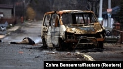 جسد یک غیرنظامی در شهر بوچا که به‌دست نیروهای نظامی روسیه کشته شده است.