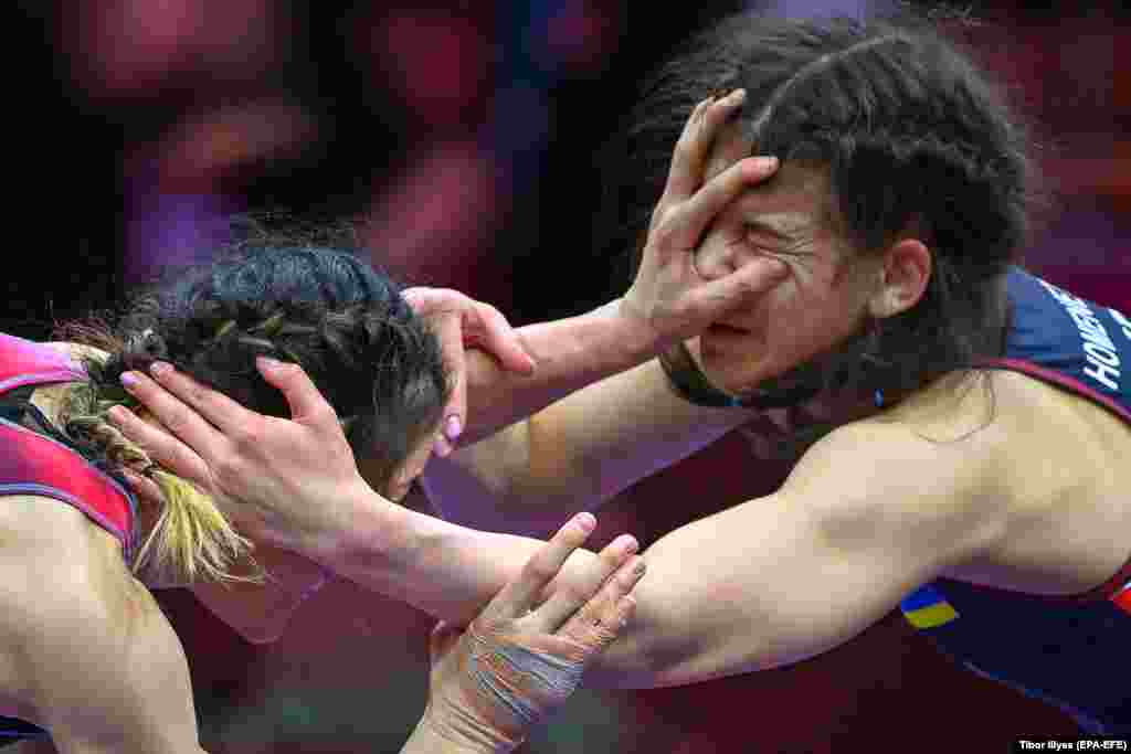 Turkey's Bediha Gun (left) in action against Ukraine's Oleksandra Khomenets at the European Wrestling Championships in Budapest, Hungary, on March 30. 