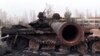 Russian Tanks, Ukrainian Cargo Plane Found Among Wreckage At Hostomel Airport screen grab