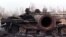 Russian Tanks, Ukrainian Cargo Plane Found Among Wreckage At Hostomel Airport screen grab