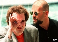  Куентин Тарантино и Брус Уилис по време на фестивала в Кан, 21 май 1994 година 