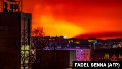 UKRAINE - Fire and smoke light up the night sky east of Kharkiv, March 30, 2022.