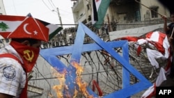 Several hundred protesters burned a Star of David near the U.S. Embassy in Lebanon today to call for an end to Israel's blockade of the Gaza Strip.