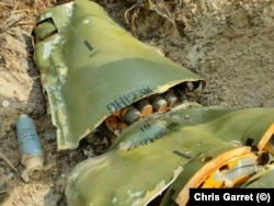 A rocket filled with bomblets at an unidentified location in Ukraine, as photographed by Chris Garrett in early April.