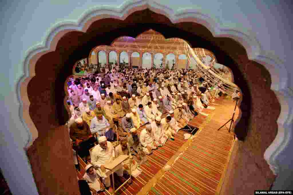 Muslims are seen offering special Taravih prayers at a mosque in Peshawar, Pakistan, during the 27th night of Ramadan, the holy month of fasting, on April 28.