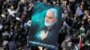 Iranian mourners gather during the final stage of funeral processions for slain commander Qassem Soleimani, in his hometown of Kerman on January 7, 2020. 