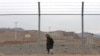 An Iranian soldier stands guard inside the Natanz uranium-enrichment facility. (file photo)