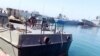 The damaged Konarak vessel, hit by a friendly fire missile during naval exercises, is docked at the Jask port, in southern Hormozgan province, May 11, 2020