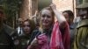 Czech model Tereza Hluskova weeps after the court decision to sentence her to eight years and eight months in prison for attempted heroin smuggling, in Lahore in March 2019.