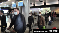 Armenia -- Armenian citizens flown back from Iran are seen at Yerevan airport, February 26, 2020.