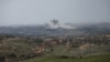 Smoke rises in Lebanon following Israeli strikes, as seen from the Israeli side of the Israel-Lebanon border on April 26.