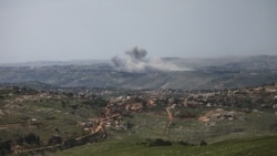 Smoke rises in Lebanon following Israeli strikes, as seen from the Israeli side of the Israel-Lebanon border on April 26.