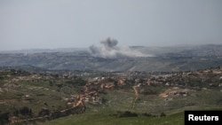Smoke rises in Lebanon following Israeli strikes on April 26.