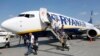 Passengers get off a Ryanair Boeing 737-8AS aircraft at the Boryspil International Airport near Kyiv in 2018.