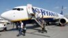 UKRAINE -- Passengers get off a Ryanair Boeing 737-8AS aircraft at the Boryspil International Airport near Kyiv, September 3, 2018