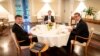 EU Special Representative Miroslav Lajcak (left) meets Kosovar Prime Minister Albin Kurti (center) and Serbian President Aleksandar Vucic at an informal dinner in Berlin.