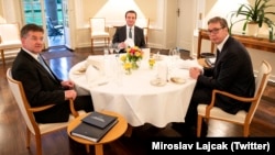 The European Union's special envoy for the Kosovo-Serbia dialogue, Miroslav Lajcak (left) with Kosovar Prime Minister Albin Kurti (center) and Serbian President Aleksandar Vucic in Berlin in May.