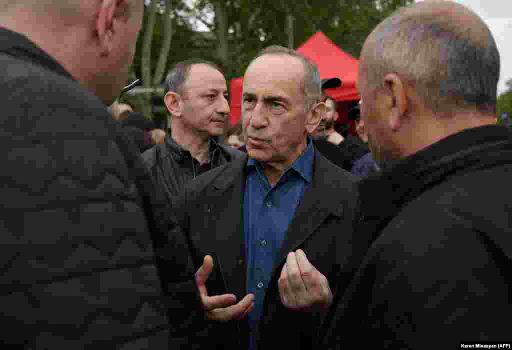 Former Armenian President Robert Kocharian speaks with protesters in Yerevan on May 3.&nbsp; Opposition figures that organized the protests accuse Pashinian of planning to let Azerbaijan take full control over Nagorno-Karabakh and demand the prime minister&#39;s resignation.