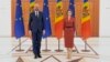 Moldovan President Maia Sandu (right) meets with the president of the European Council, Charles Michel, in Chisinau on May 4.