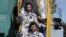 U.S. astronaut Nick Hague and Russian cosmonaut Aleksei Ovchinin board the Soyuz MS-10 spacecraft for the launch at the Baikonur Cosmodrome, Kazakhstan, on October 11.
