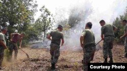 The army of the Republic of Macedonia extinguishes forest fires.Courtesy photo by ARM. 