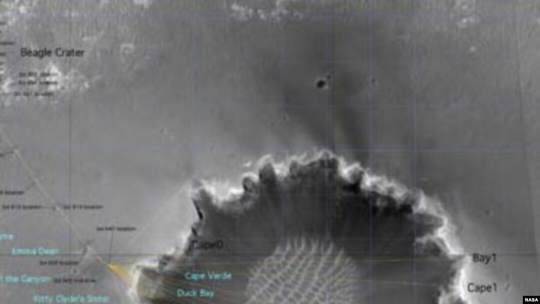 Кратер Виктория (Victoria Crater). Фотография выполнена спутником Mars Orbiter. NASA Наблюдение кратера помогает ученым выбрать оптимальный маршрут для марсохода Opportunity (Mars Exploration Rover Opportunity).