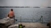 A ship passes along the Croatian coast through Piran on June 27. A court at The Hague has ruled that Zagreb should grant neighboring Slovenia "uninterrupted access" to the high seas via the bay