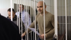 Andrei Pivovarov attends a trial session in court on May 5, 2022.