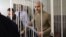 Andrei Pivovarov attends a trial session in court on May 5, 2022.