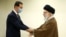 Syrian President Bashar al-Assad (left) greets Supreme Leader Ayatollah Ali Khamenei in Tehran on May 8.