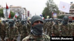 اعضای یگان ویژه سپاه پاسداران انقلاب اسلامی در راه‌پیمایی حکومتی «روز قدس» در تهران؛ ثبت شده در ۲۹ آوریل ۲۰۲۲