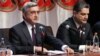 Armenia -- President Serzh Sarkisian (L) and Prime Minister Tigran Sarkisian at a congress of the ruling Republican Party, Yerevan, 10Mar2012.