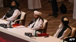 Членове на делегацията на талибаните на мирните преговори между тях, афганистанското правителство и САЩ в Катар на 12 септември