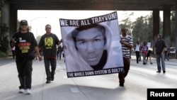 Demonstrators block traffic on a highway in Los Angeles as they protest the acquittal of George Zimmerman in the Trayvon Martin trial on July 14.