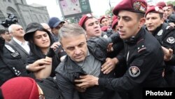 Armenia - Security forces try to arrest former Armenian police chief Valeri Osipian during an opposition demonstration in Yerevan, May 6, 2022.