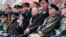 Russian President Vladimir Putin (center) watches a military parade marking the 77th anniversary of the Soviet Union's contribution to victory over Nazi Germany in World War II, in Red Square on May 9.
