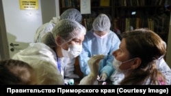 Ukrainian refugees from Mariupol undergo a health check in Primorsky Krai on May 6.